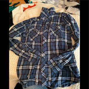 Long sleeve plaid shirt.